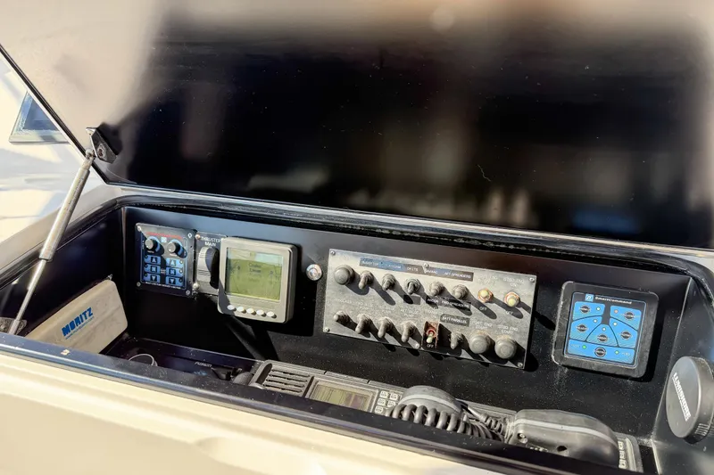 Slide: The Image of Control panel of a 2013 Viking 46 Convertible yacht with various instruments. - 40