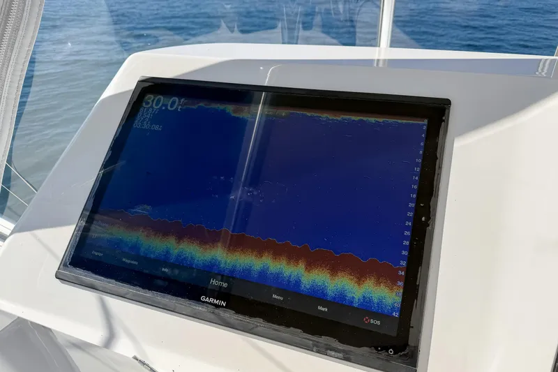 Slide: The Image of Garmin marine display on 2013 Viking 46 Convertible, showing sonar data. - 47