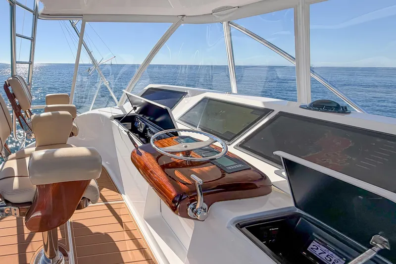 Slide: The Image of Luxurious helm of 2013 Viking 46 Convertible yacht with ocean view. - 49