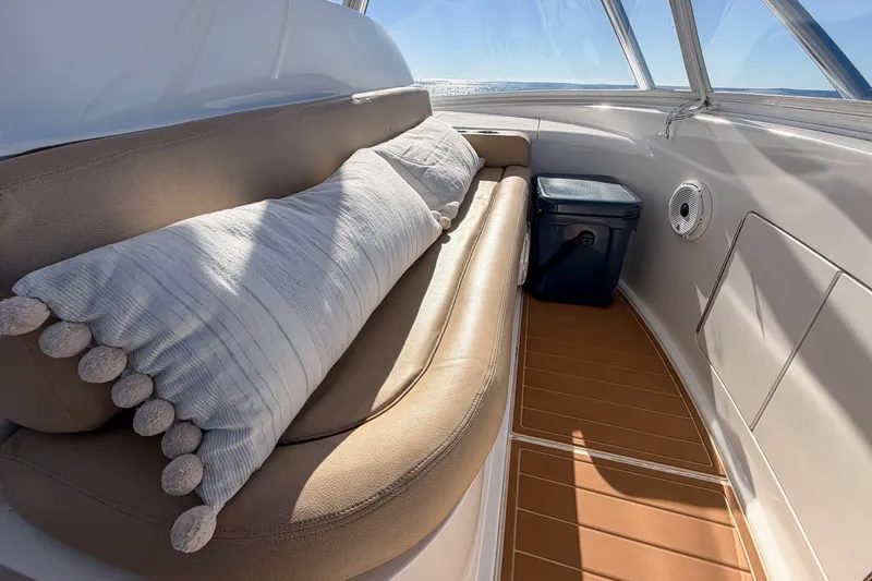 Slide: The Image of Luxurious seating area on a 2013 Viking 46 Convertible yacht with ocean view. - 52