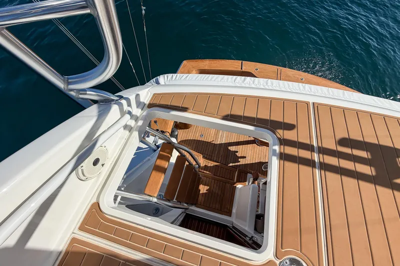 Slide: The Image of View from the deck of a 2013 Viking 46 Convertible yacht over the ocean. - 55