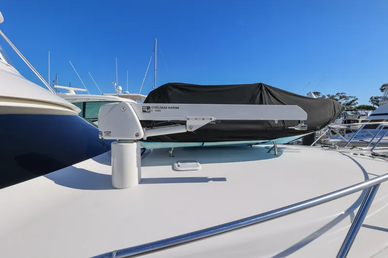 Slide: The Image of 2013 Viking 46 Convertible yacht with covered equipment on deck. - 63