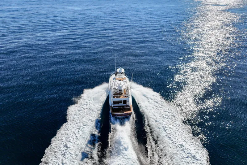 Slide: The Image of Aerial view of 2013 Viking 46 Convertible yacht cruising on open sea. - 74