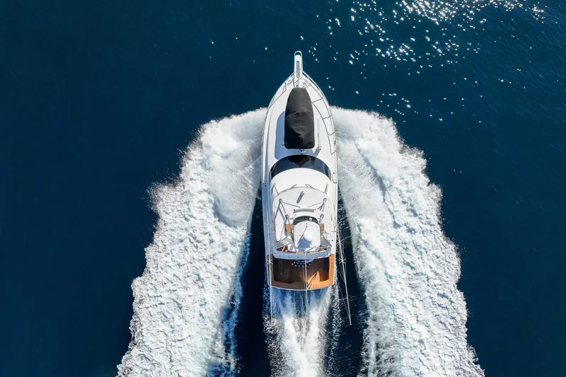 Slide: The Image of Aerial view of 2013 Viking 46 Convertible yacht cruising on blue ocean waters. - 80