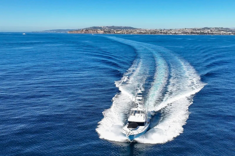 Slide: The Image of Aerial view of 2013 Viking 46 Convertible yacht cruising on open blue sea. - 81