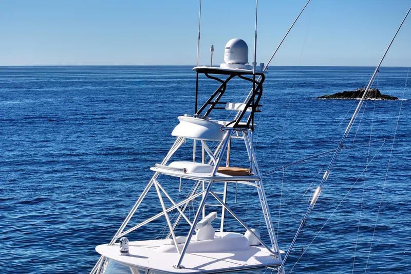 Slide: The Image of Viking 46 Convertible 2013 yacht tower against a clear blue ocean backdrop. - 84