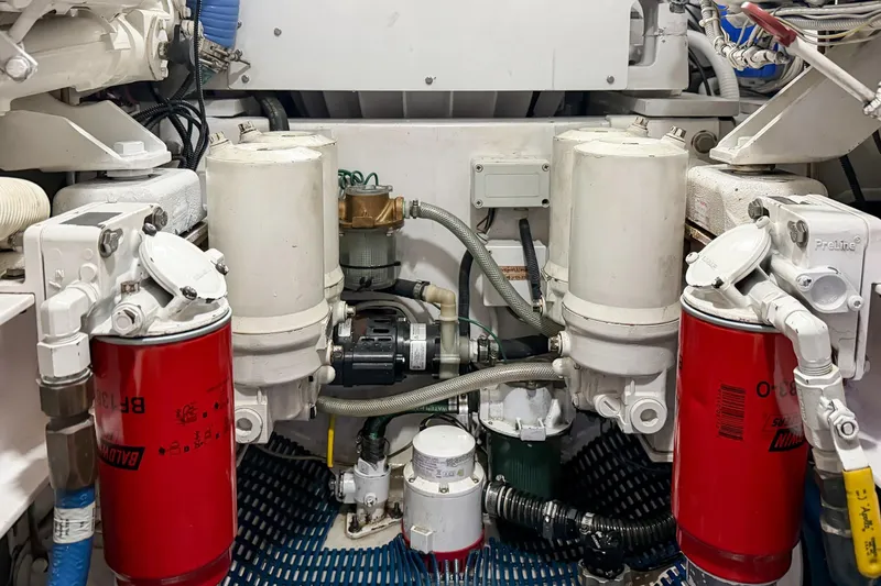 Slide: The Image of Engine room of 2013 Viking 46 Convertible yacht with filters and machinery. - 93