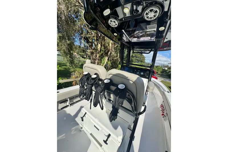 Slide: The Image of 2024 Sportsman Masters 247OE Bay Boat interior with seating and storage features. - 20