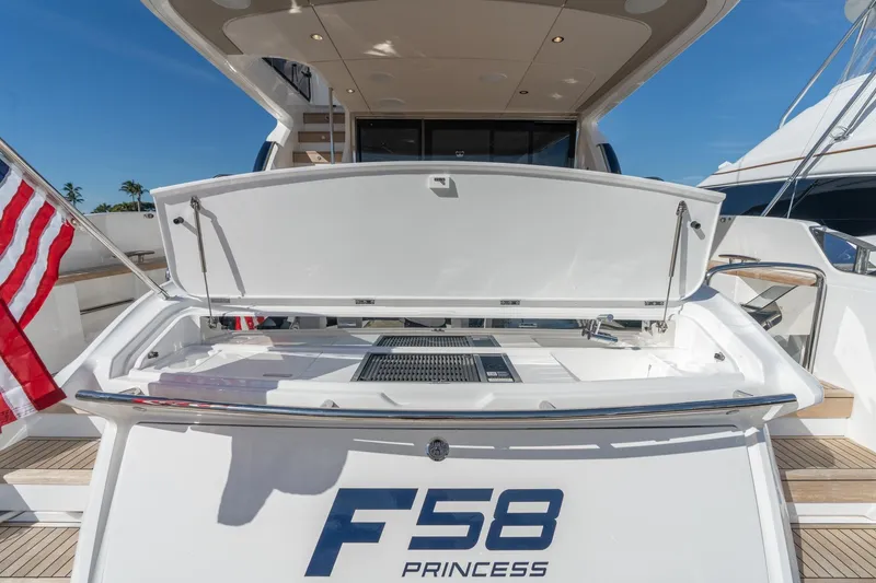 Slide: The Image of Luxurious 2026 Princess F58 yacht interior with spacious seating and elegant design. - 13