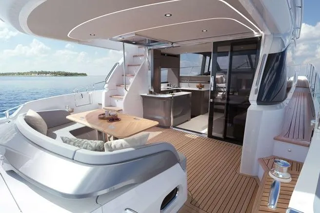 Slide: The Image of 2026 Princess F58 yacht cruising near palm-lined waterfront homes. - 2