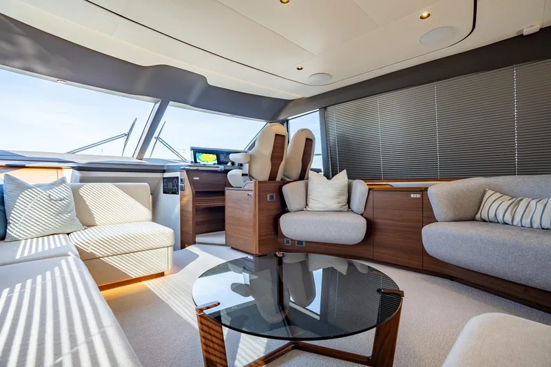 Slide: The Image of Luxurious 2026 Princess F58 yacht interior with modern navigation system and plush seating. - 27