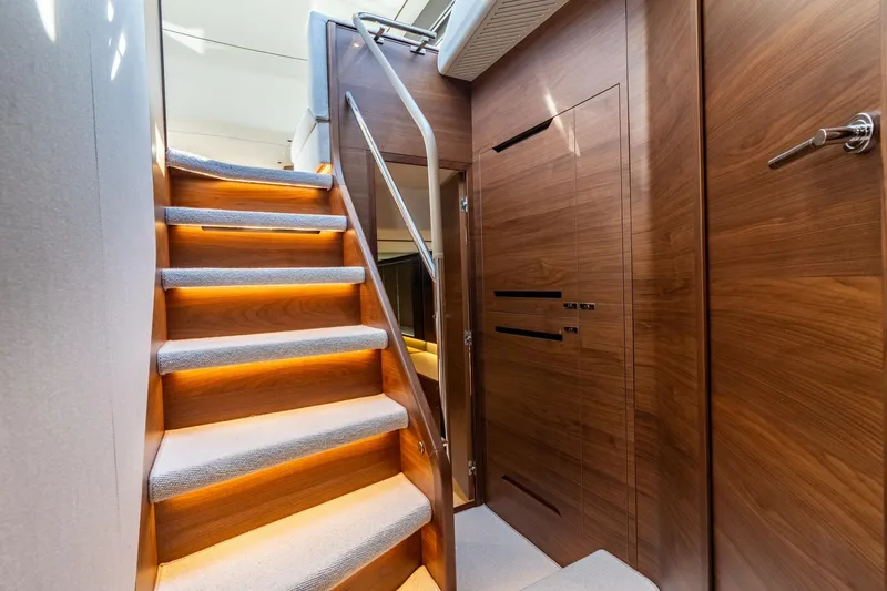 Slide: The Image of Luxurious 2026 Princess F58 yacht interior with modern kitchen and elegant seating area. - 31
