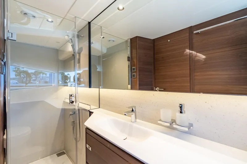 Slide: The Image of Luxurious interior staircase of 2026 Princess F58 yacht with wooden finish and ambient lighting. - 32