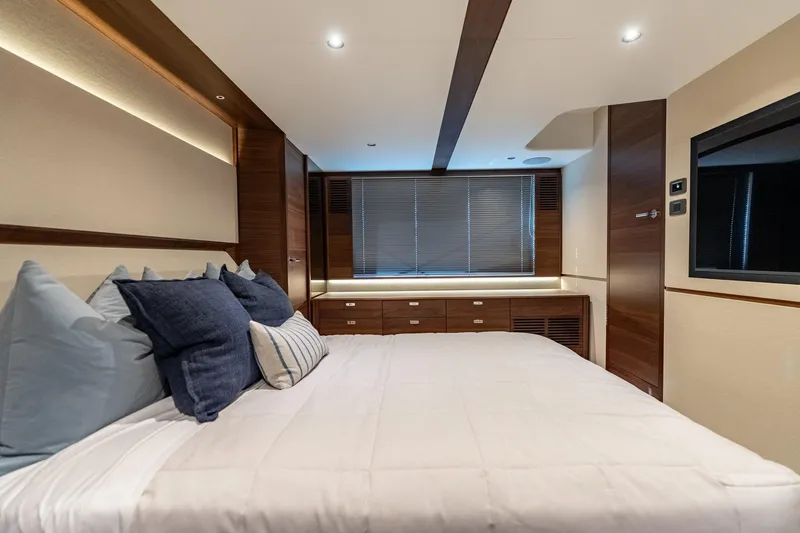 Slide: The Image of Luxurious bedroom interior of 2026 Princess F58 yacht with modern design and large TV. - 35
