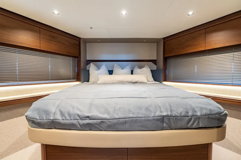 Slide: The Image of Luxurious bathroom interior on 2026 Princess F58 yacht, featuring wood accents and modern fixtures. - 42