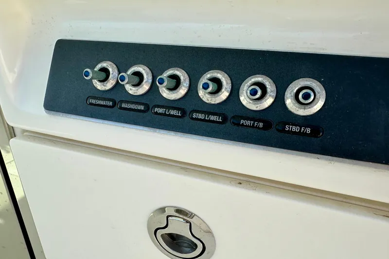 Slide: The Image of Control panel on a 2018 Boston Whaler 320 Vantage boat. - 20