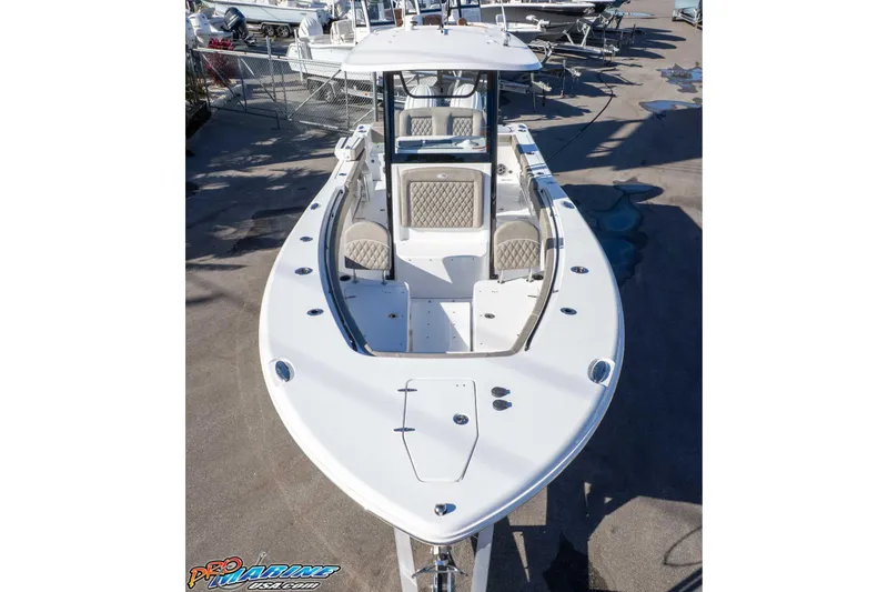 Slide: The Image of 2026 Sea Hunt Gamefish 25 boat, top view, showcasing spacious deck and seating. - 34