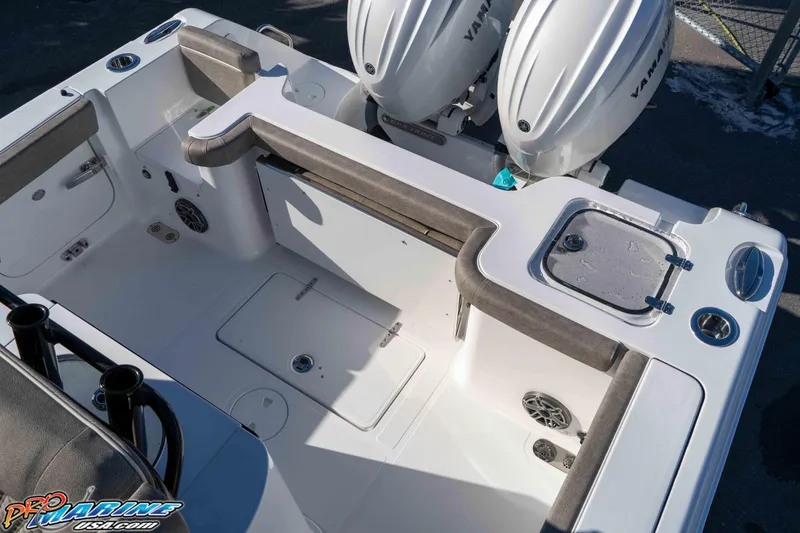 Slide: The Image of 2026 Sea Hunt Gamefish 25 boat interior with dual engines and fishing amenities. - 44