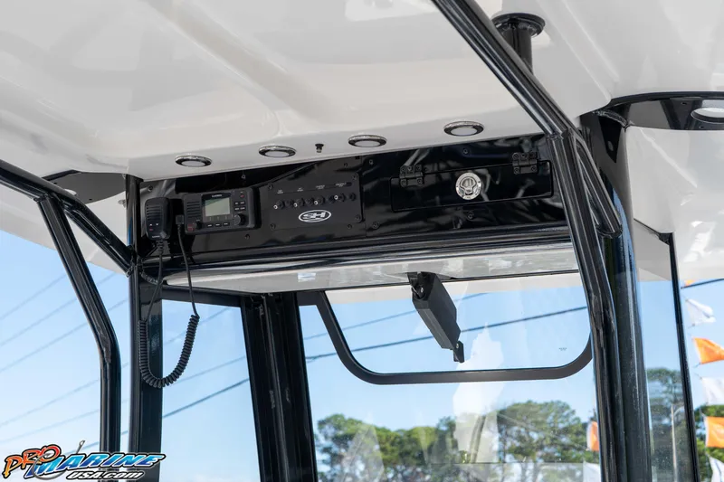 Slide: The Image of 2026 Sea Hunt Gamefish 25 boat console with electronics and controls. - 48