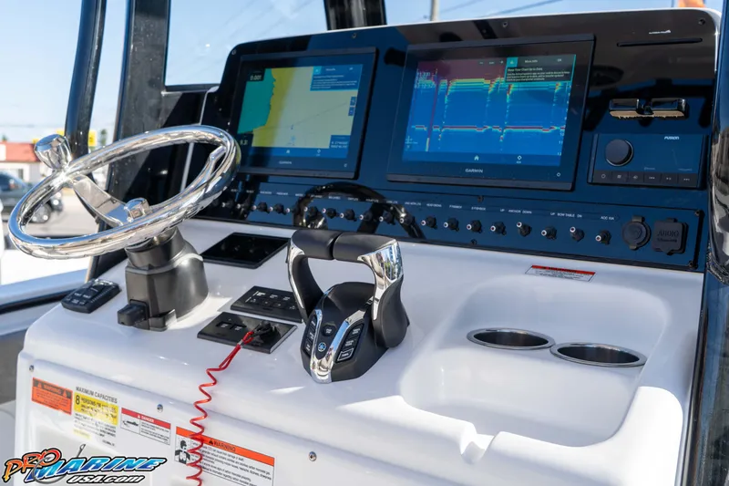 Slide: The Image of 2026 Sea Hunt Gamefish 25 dashboard with advanced navigation and control systems. - 52