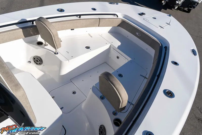 Slide: The Image of 2026 Sea Hunt Gamefish 25 boat interior with seating and storage compartments. - 54