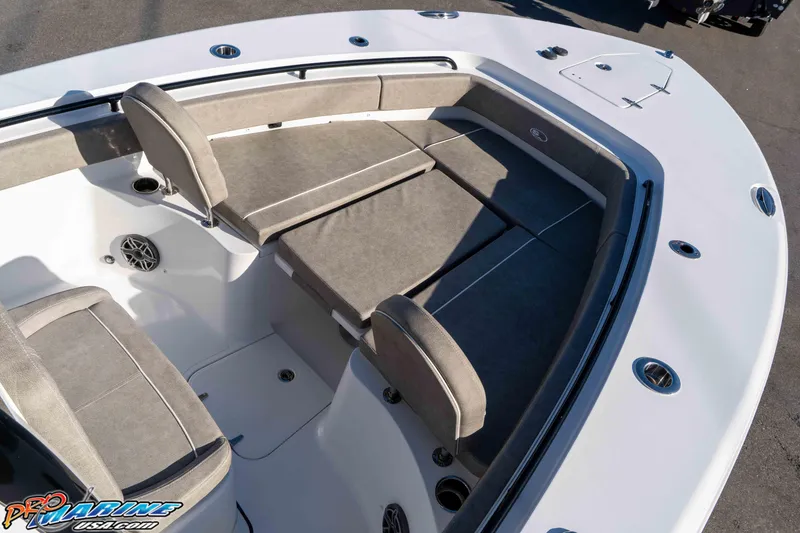 Slide: The Image of 2026 Sea Hunt Gamefish 25 boat interior with cushioned seating and sleek design. - 56