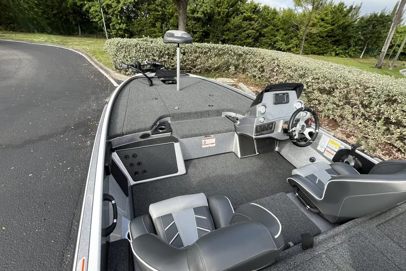 Slide: The Image of 2024 Nitro Z18 boat interior with modern dashboard and seating. - 6
