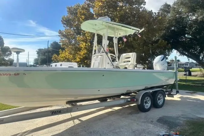 Slide: The Image of 2016 Pathfinder 2600 HPS boat on trailer in storage facility. - 2