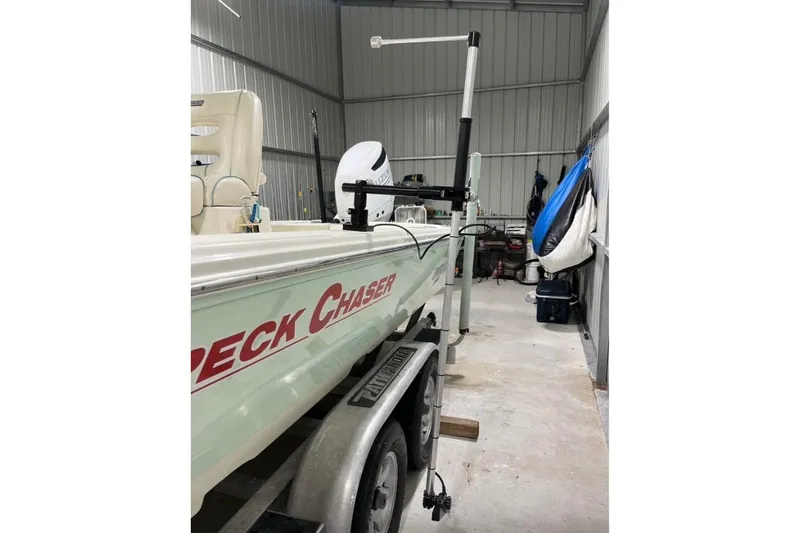 Slide: The Image of 2016 Pathfinder 2600 HPS boat on trailer in a metal storage unit. - 3