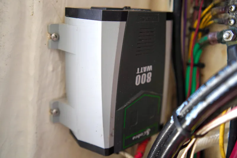 Slide: The Image of 800-watt power inverter mounted on wall, surrounded by colorful wiring, Release 240 RX 2017 model. - 19