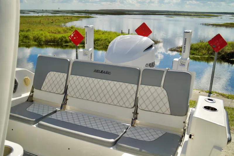 Slide: The Image of 2017 Release 240 RX boat with Yamaha engine by a scenic waterway. - 25