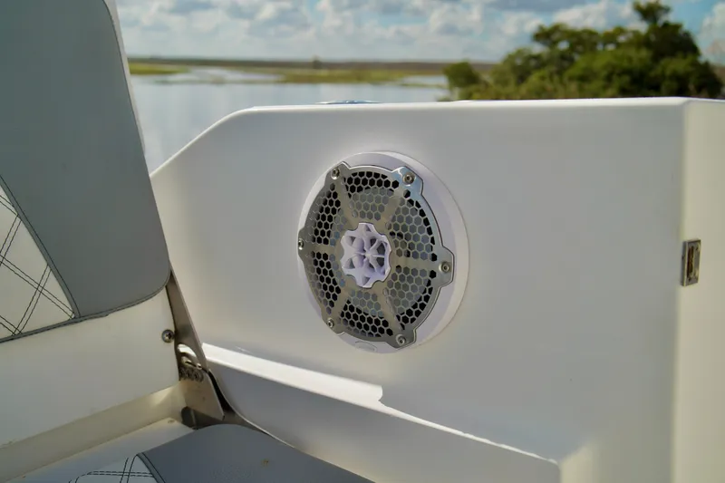 Slide: The Image of Speaker on a 2017 Release 240 RX boat, with scenic water view. - 26