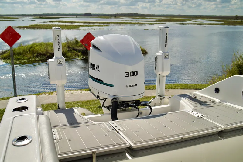 Slide: The Image of 2017 Release 240 RX boat with Yamaha 300 engine by a scenic lake. - 27