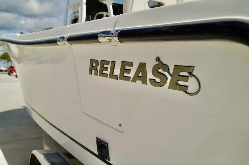 Slide: The Image of 2017 Release 240 RX boat with logo detail on side. - 32