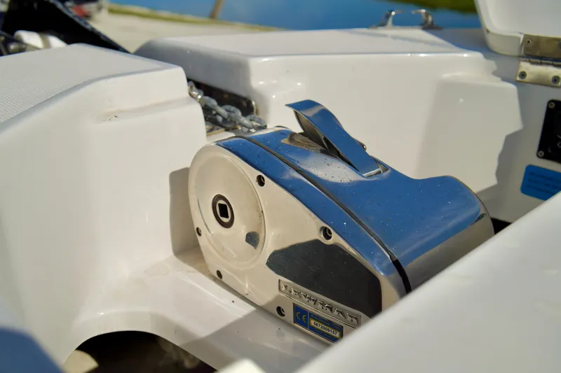 Slide: The Image of Close-up of a 2017 Release 240 RX boat's anchor winch mechanism. - 8
