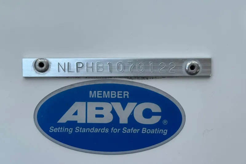 Slide: The Image of Tidewater 2300 Carolina Bay 2022 boat with ABYC membership plate and serial number. - 30