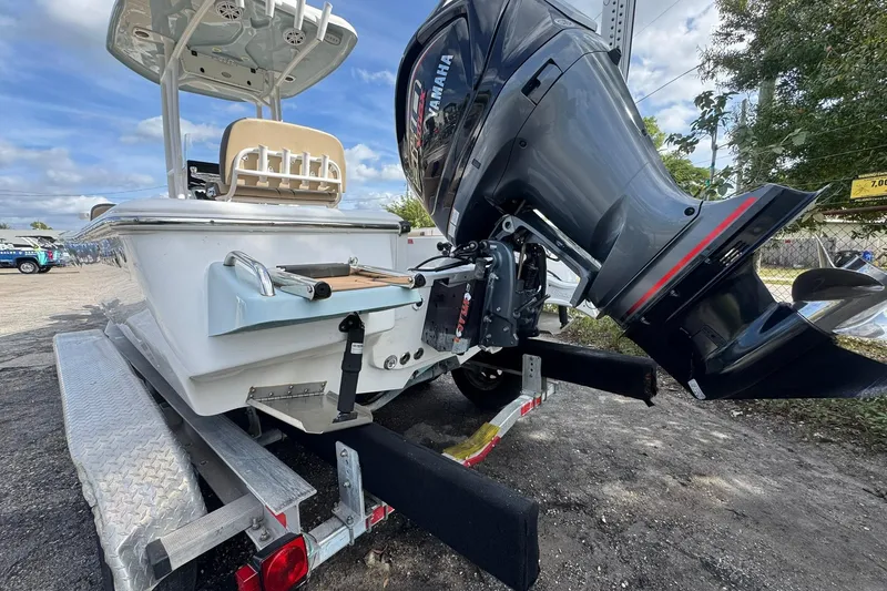 Slide: The Image of 2022 Tidewater 2300 Carolina Bay boat on trailer with Yamaha outboard motor. - 4