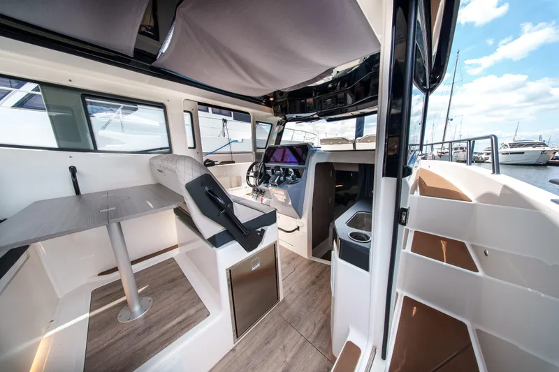 Slide: The Image of Interior of 2026 Navan C30 boat, featuring modern design and advanced navigation controls. - 27