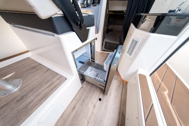 Slide: The Image of Interior of 2026 Navan C30 boat with open storage compartments and modern design. - 29