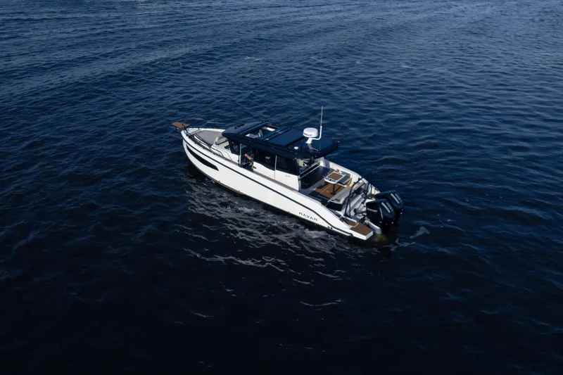 Slide: The Image of 2026 Navan C30 boat cruising on open water, showcasing sleek design and modern features. - 45