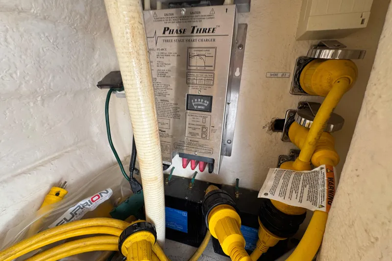 Slide: The Image of Electrical system of a 2003 Riviera Cruiser M470 Excalibur with smart charger and cables. - 15