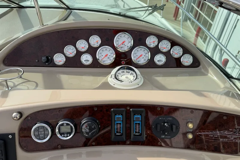 Slide: The Image of Dashboard of 2003 Riviera Cruiser M470 Excalibur with gauges and controls. - 27