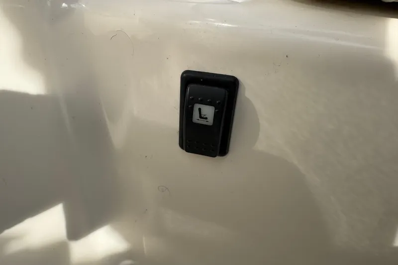 Slide: The Image of Close-up of a switch on a 2003 Riviera Cruiser M470 Excalibur boat. - 29