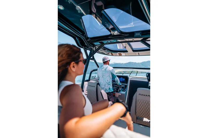 Slide: The Image of 2026 Navan S30 boat interior with passengers enjoying a scenic ride. - 38
