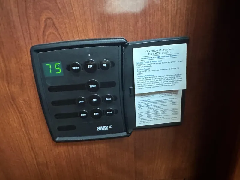Slide: The Image of Thermostat control panel on 2004 Sea Ray 390 Motor Yacht, displaying temperature at 75 degrees. - 19