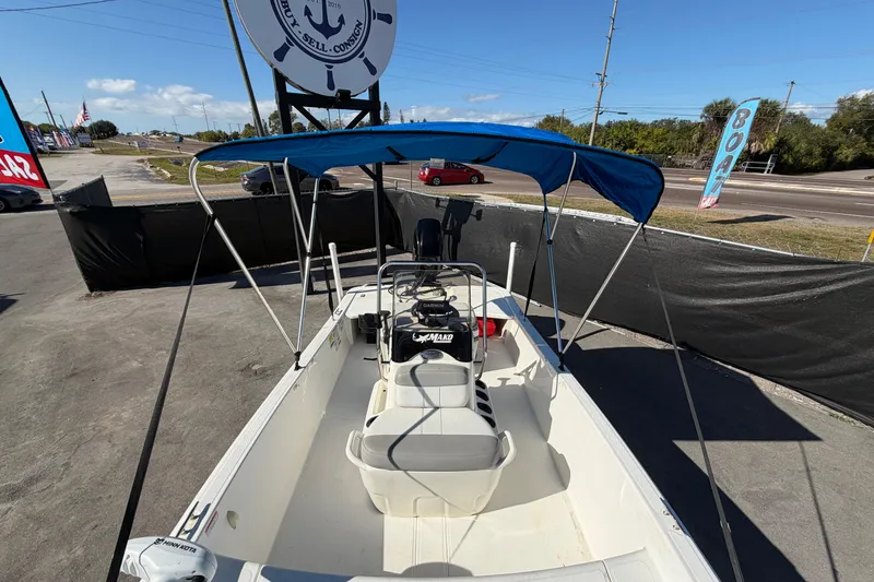 Slide: The Image of Close-up of a tachometer on a 2019 Mako Pro Skiff 15 CC boat. - 23