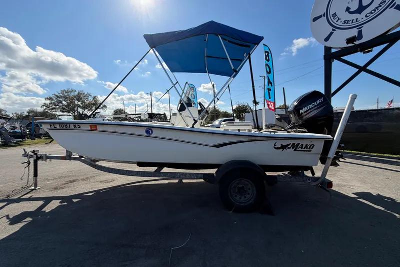 Slide: The Image of 2019 Mako Pro Skiff 15 CC boat propeller on trailer, close-up view. - 6