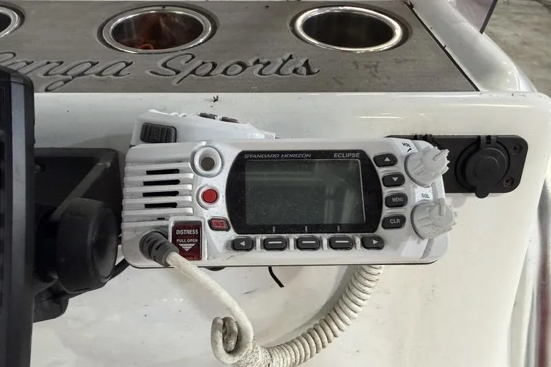 Slide: The Image of VHF marine radio on 2023 Panga 22 SPORT boat dashboard. - 10