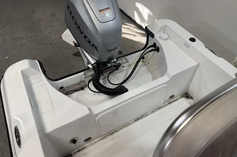 Slide: The Image of 2023 Panga 22 SPORT boat with Honda outboard motor, interior view. - 7