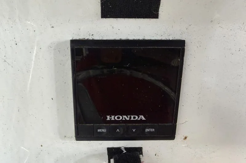 Slide: The Image of Honda display panel on 2023 Panga 22 SPORT boat dashboard. - 12